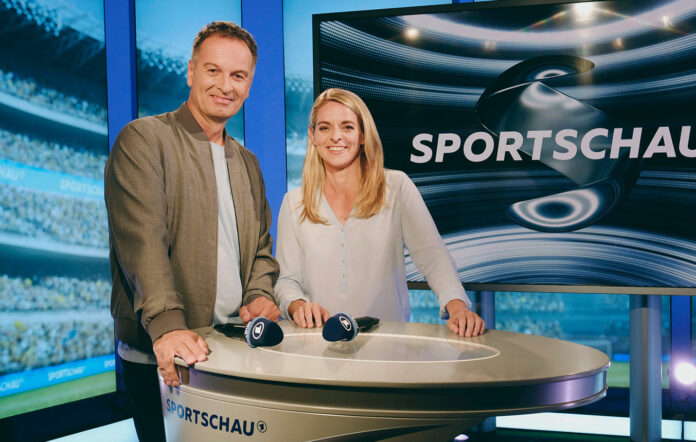 Claus Lufen und Nia Künzer präsentieren gemeinsam die Frauenfußball Weltmeisterschaft im Ersten