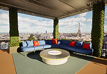 Warner Bros. Discovery: Sendekonzept zu Olympischen Spielen WBD-Studio mit Blick über die Dächer von Paris