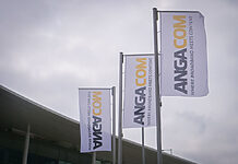 Hendrik Wüst eröffnet ANGA COM 2025 in Köln ANGA COM Fahnen vor der Köln Messe